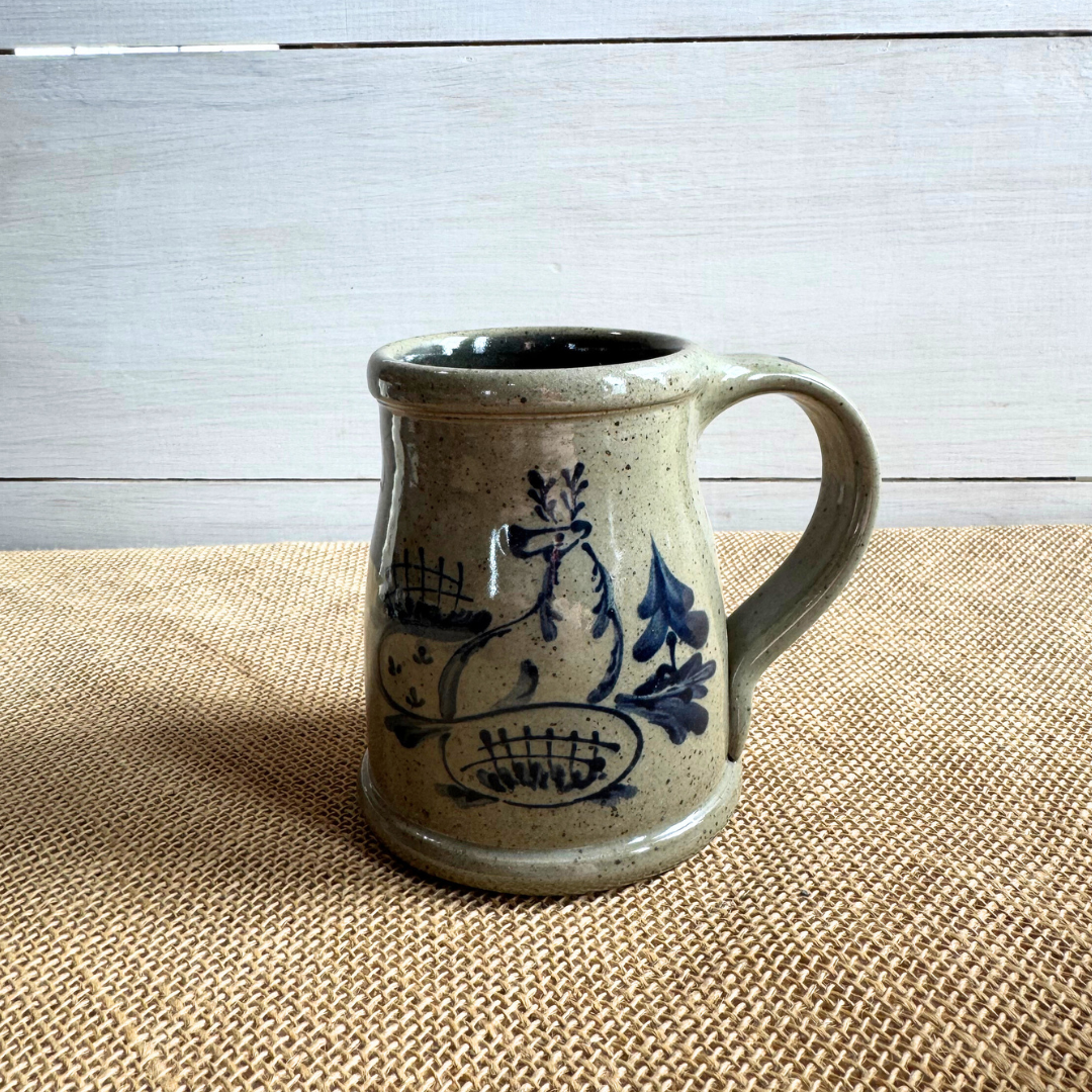 Rowe Pottery Hand thrown stoneware mug In a hand decorated Norton Deer pattern
