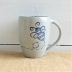 Rowe Pottery Hand thrown stoneware mug In a hand decorated Bumble Bee pattern