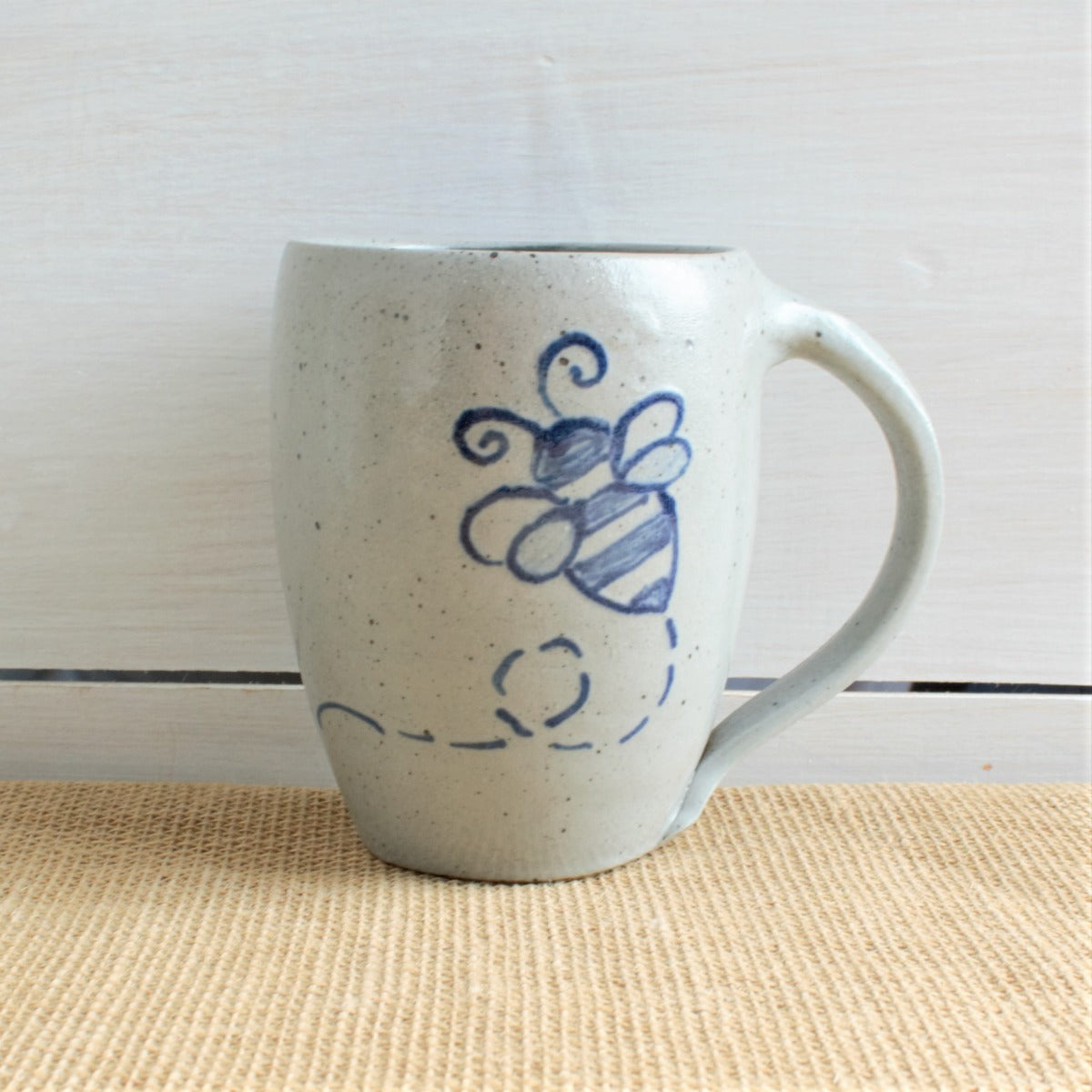 Rowe Pottery Hand thrown stoneware mug In a hand decorated Bumble Bee pattern
