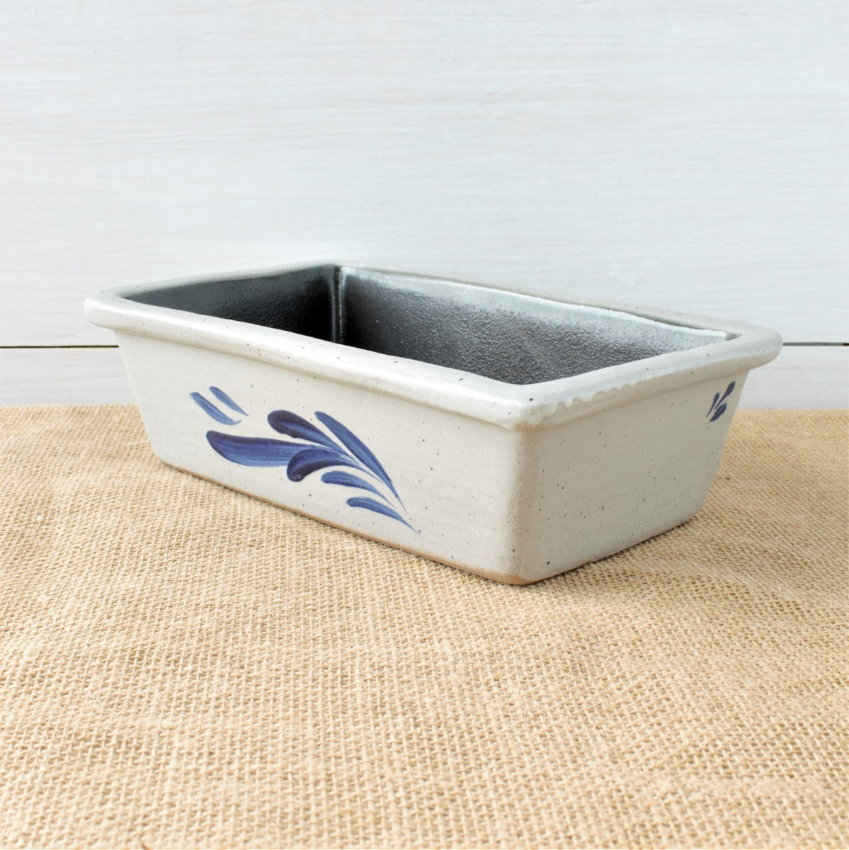 Rowe Pottery handmade stoneware bread baker in a classic cambridge pattern corner view
