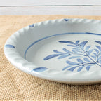 Rowe Pottery handmade stoneware pie plate with Teaberry pattern zoomed in detail view