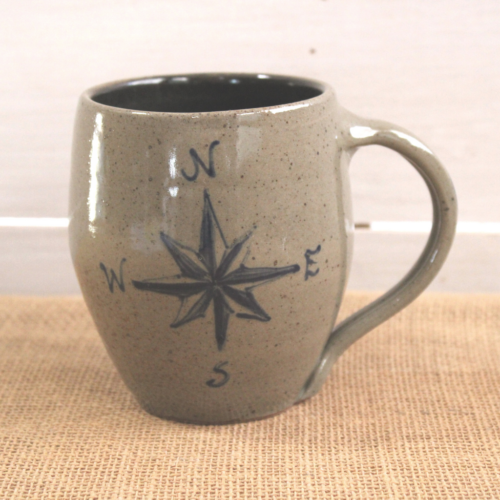 Rowe Pottery Hand thrown stoneware mug In a hand decorated compass pattern