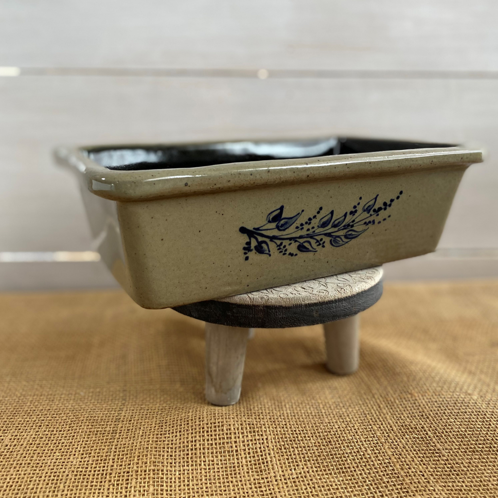 Rowe Pottery handmade stoneware bread baker with farm floral pattern and a warm mocha glaze