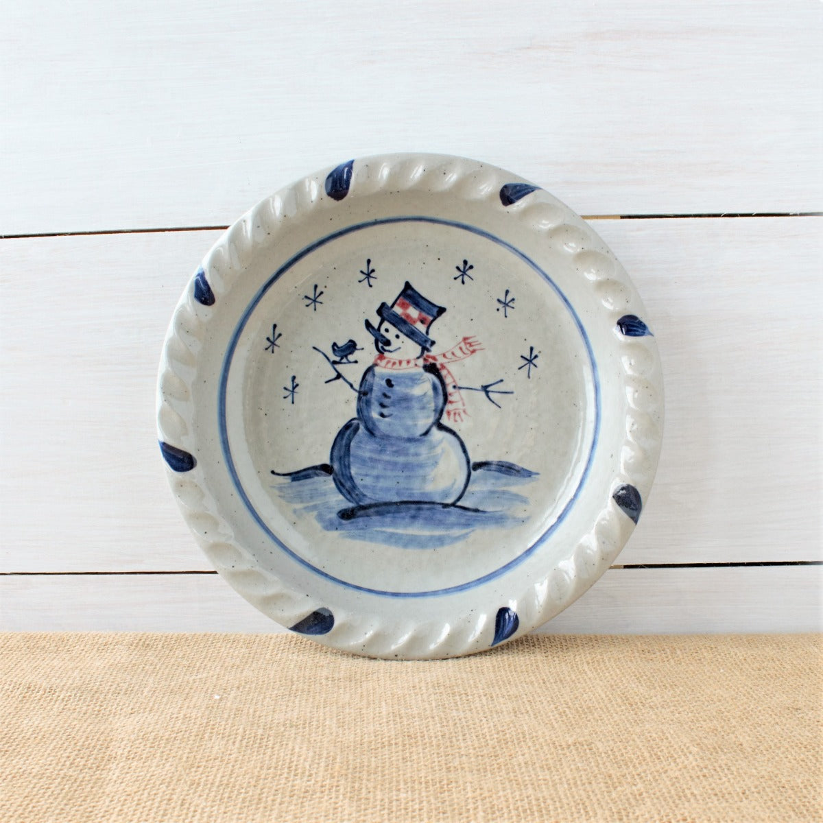 Rowe Pottery handmade stoneware pie plate with Snowman pattern