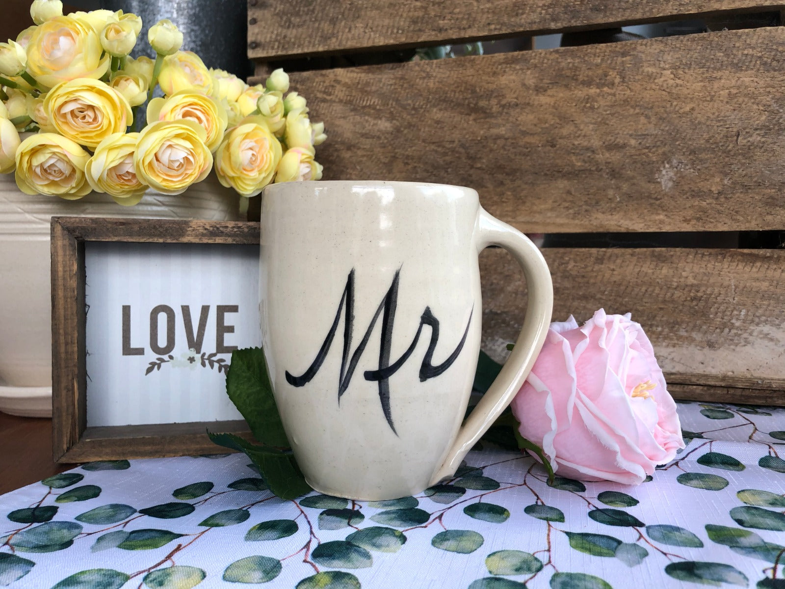 Rowe Pottery Hand thrown stoneware mug In a hand decorated Mr. pattern