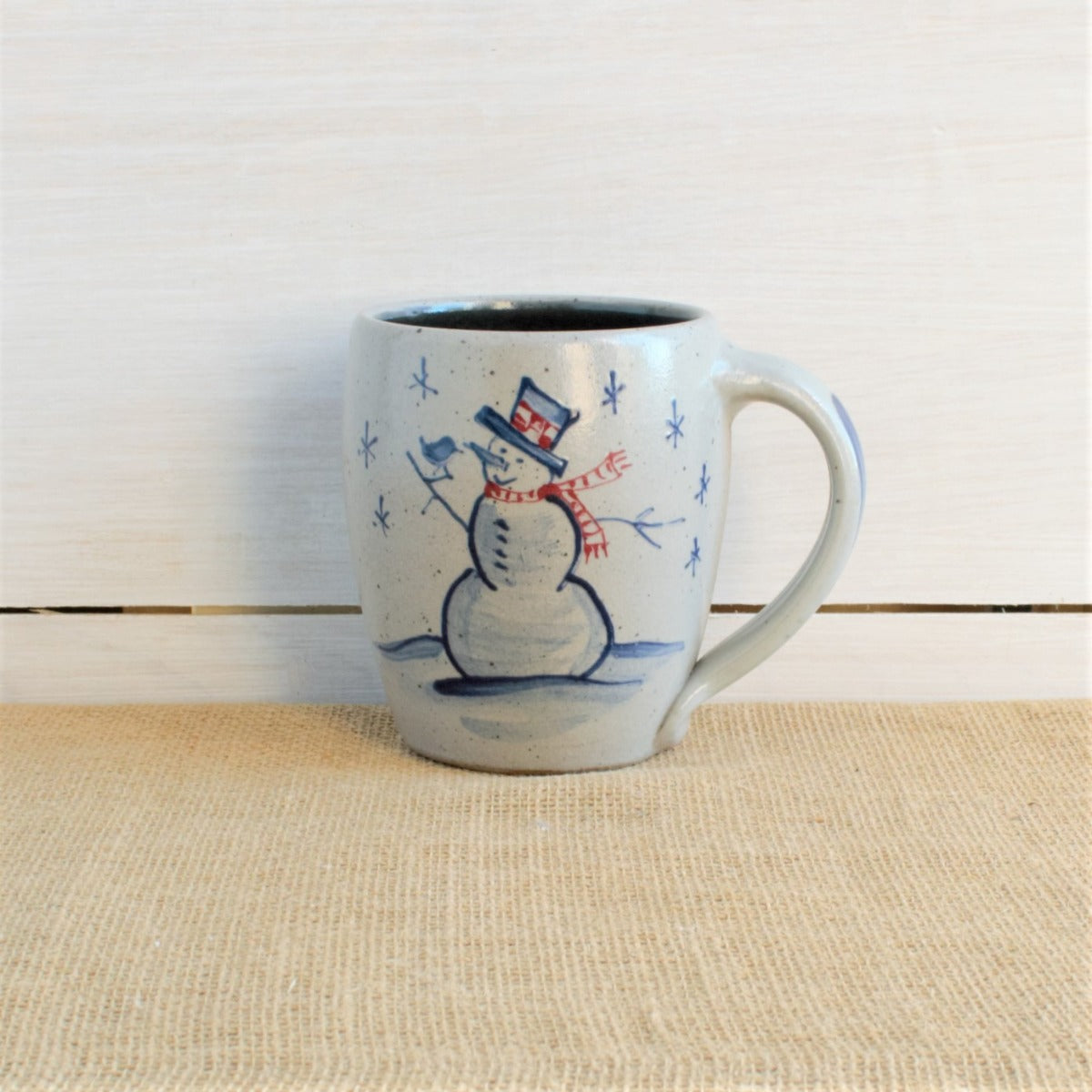 Rowe Pottery Hand thrown stoneware mug In a hand decorated Snowman pattern