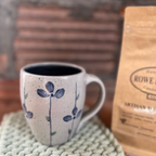 Rowe Pottery Hand thrown stoneware mug In a hand decorated Petals in Bloom pattern