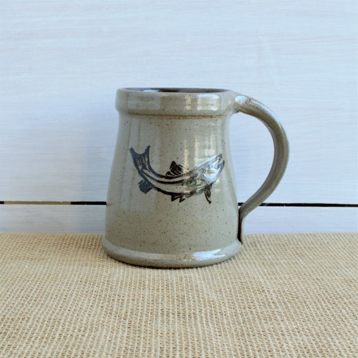 Rowe Pottery Hand thrown stoneware mug In a hand decorated Northwoods Fish pattern