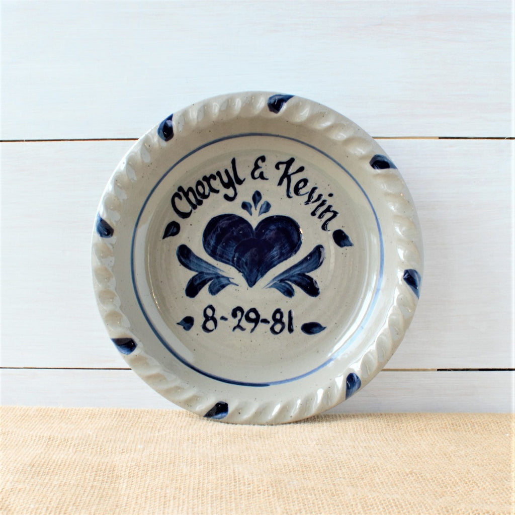 Rowe Pottery handmade stoneware pie plate with Personalized pattern on wood background