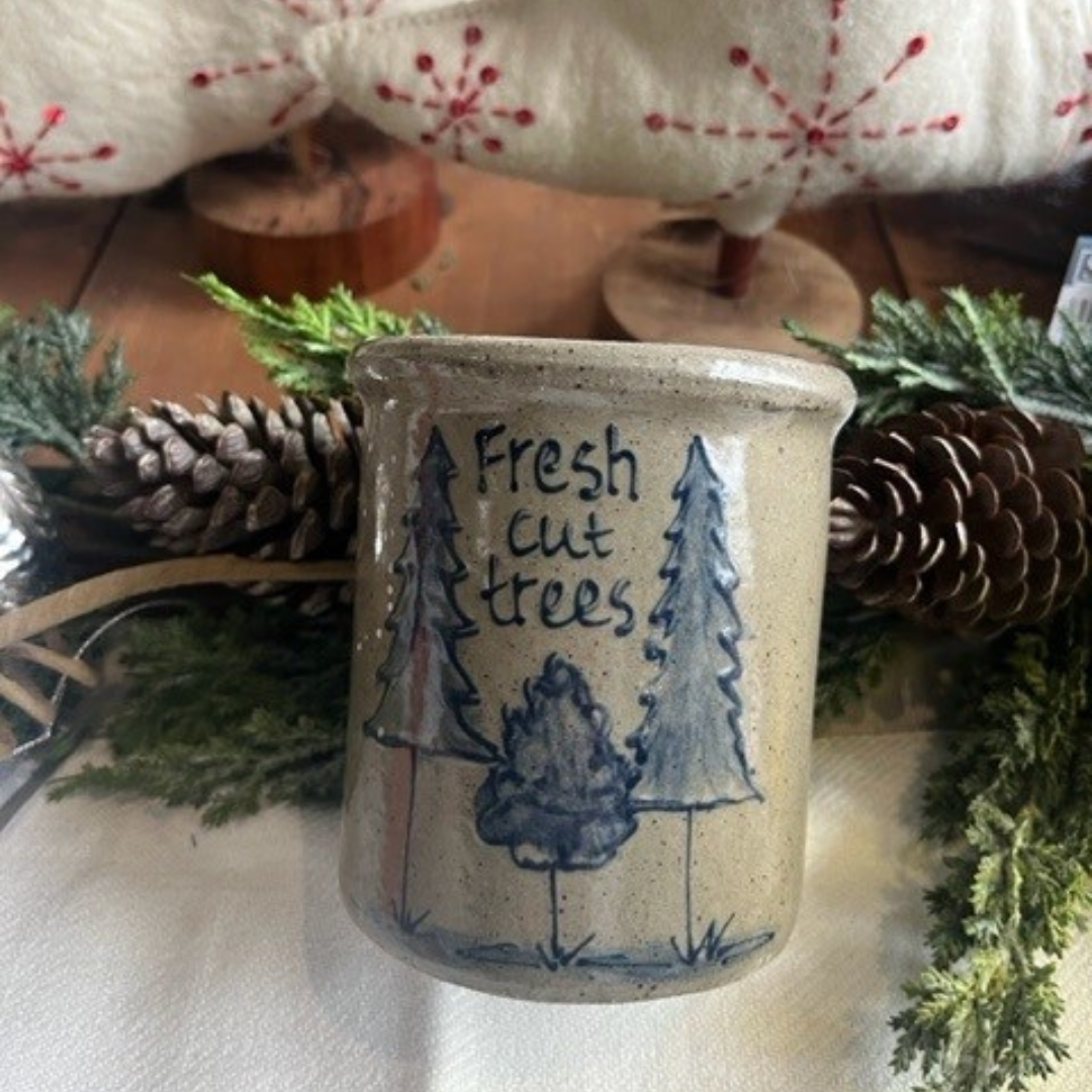 Rowe Pottery handmade stoneware candle crock in a hand decorated fresh cut trees pattern