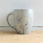 Rowe Pottery Hand thrown stoneware mug In a hand decorated wildflower pattern back